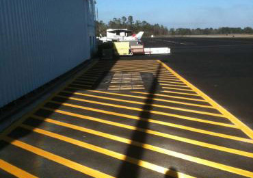 Bight Yellow white Airport Runway highway streets parking roads line marking striping paint.