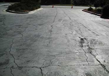 Repair of wide deep cracks on asphalt driveways roads streets.