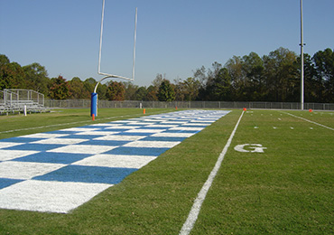 football endzone field line paint with reflectivity brightner under lights.
