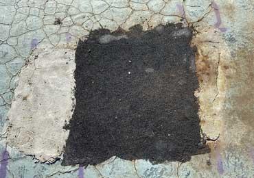 concrete patches reinforced top coated with strong liquid binder.