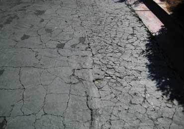 Cracked asphalt driveway repair.
