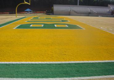 Football Endzone Bright Yellow Paint dark green colors grass painting.