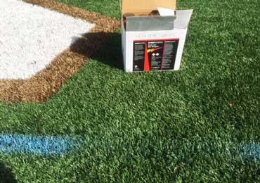 remove lines from synthetic turf fields with aerosol can spray remover