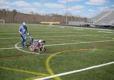 Painting removable lines line striping temporary lines soccer lacrosse football synthetic turf.