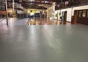 several colors of high gloss or flat poly urethane ware house coatings floor paints.