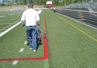 Lacrosse lines synthetic field turf line marking painting.