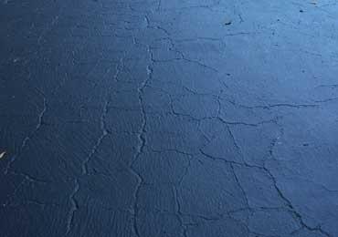 Protect repair extremely damaged asphalt.