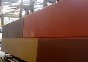 Colors of Lithium protective coating on smooth precast concrete slab wall.
