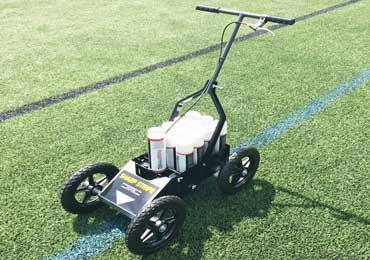 paint straight lines on natural grass or synthetic turf athletic fields.