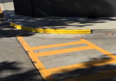 use on parking lot parking garage parking lot street road street concrete curbs.