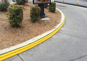 install bank drive through curb protection stop damages to car rims wheels