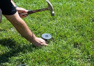 install hammer in ground soccer field markers.