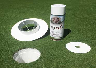 metal bracket over spray paint shield golf course putting hole painting.