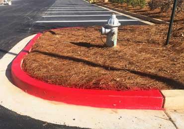 painting concrete curbs safety red fire lane with water base solvent based paints.