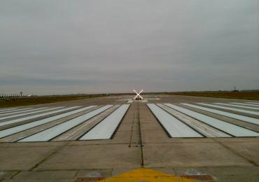 reflective airport runway paint white.