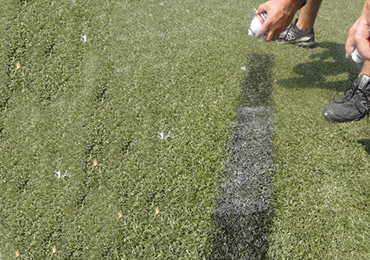 remover soak agitate rinse paint water synthetic field turf.