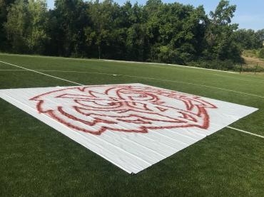 custom mascot stencil manufactured for synthetic field turf football field.