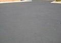 Asphalt Parking Lot repair coating paint crack filler crack repair coating.