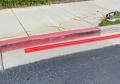 protect curbs road street parking lot deck concrete red color.
