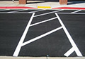 Parking Lot red traffic line marking paint.