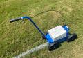 blue metal striper for painting line marking athletic field lines.