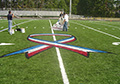 Flag ribbon stencil paint synthetic field turf painting.