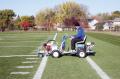 Athletic Field ride on painting striping air less paint striping machine.