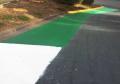 Green white colors heat reflective asphalt sealer coating.