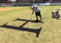 Painting of corporate logo on athletic fields