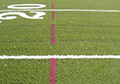 Temporary lacrosse lines on synthetic field turf.