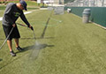 Rinse water paint synthetic field turf paint lines.
