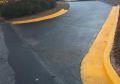 Yellow safety curb paint asphalt crack filler sealer.