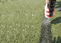 Spray remover paint line synthetic turf field painted lines.