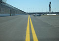 White Yellow traffic line marking striping paint striping Daytona motor speedway.