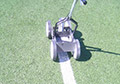 White aerosol spray chalk temporary removable lines synthetic field turf.