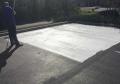 application of white asphalt parking lot sealer to reduce global warming