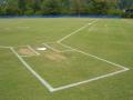 Water based white line marking paint for baseball fields.