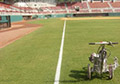 Stripe marking painting baseball field foul grass turf lines baseball batters box.