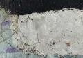 concrete patch falling breaking apart peeling not durapave liquid side.