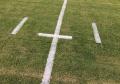 paint lines of football field lines yard line hash marks with robot.
