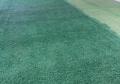 cover up old inlaid lines on synthetic turf with dura stripe aerosol then paint entire turf field green with permanent dye paint
