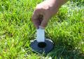 install lining peg in ground sockets when painting lines on football field.