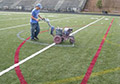 Spray application removable synthetic field turf line marking paint.