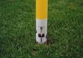 push plastic field marker in the ground.