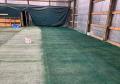 painting over sewed in white lines on used turf using permanent aerosol paint cover up green.