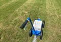 Pro Liner aerosol can line striping machine for football field lines.