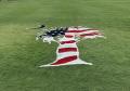 fund raising painting high school university team logos mascots on home grass turf yards lawns