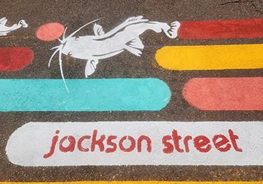 Traffic paint manufacturer can custom match colors cut custom stencils.