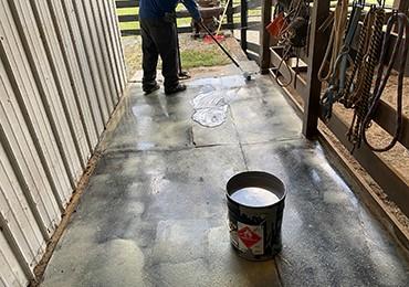 application of liquid repair coating to re surface re new rubber mats horse stall barn walkway