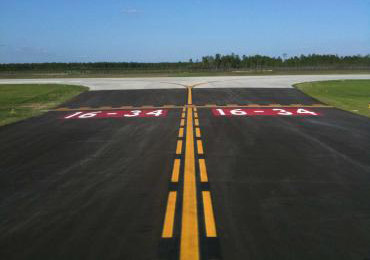 Airport runway yellow marking line paint.